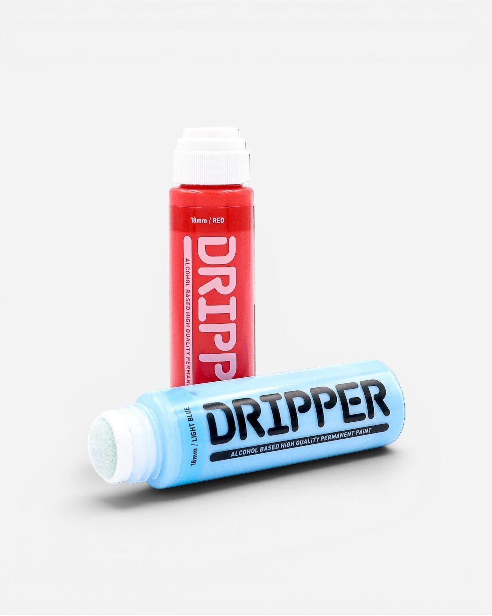 Astrofat Dripper 18mm tagging marker in red and light blue. Squeezable alcohol-based paint marker with a 30ml tank and replaceable 18mm tip.