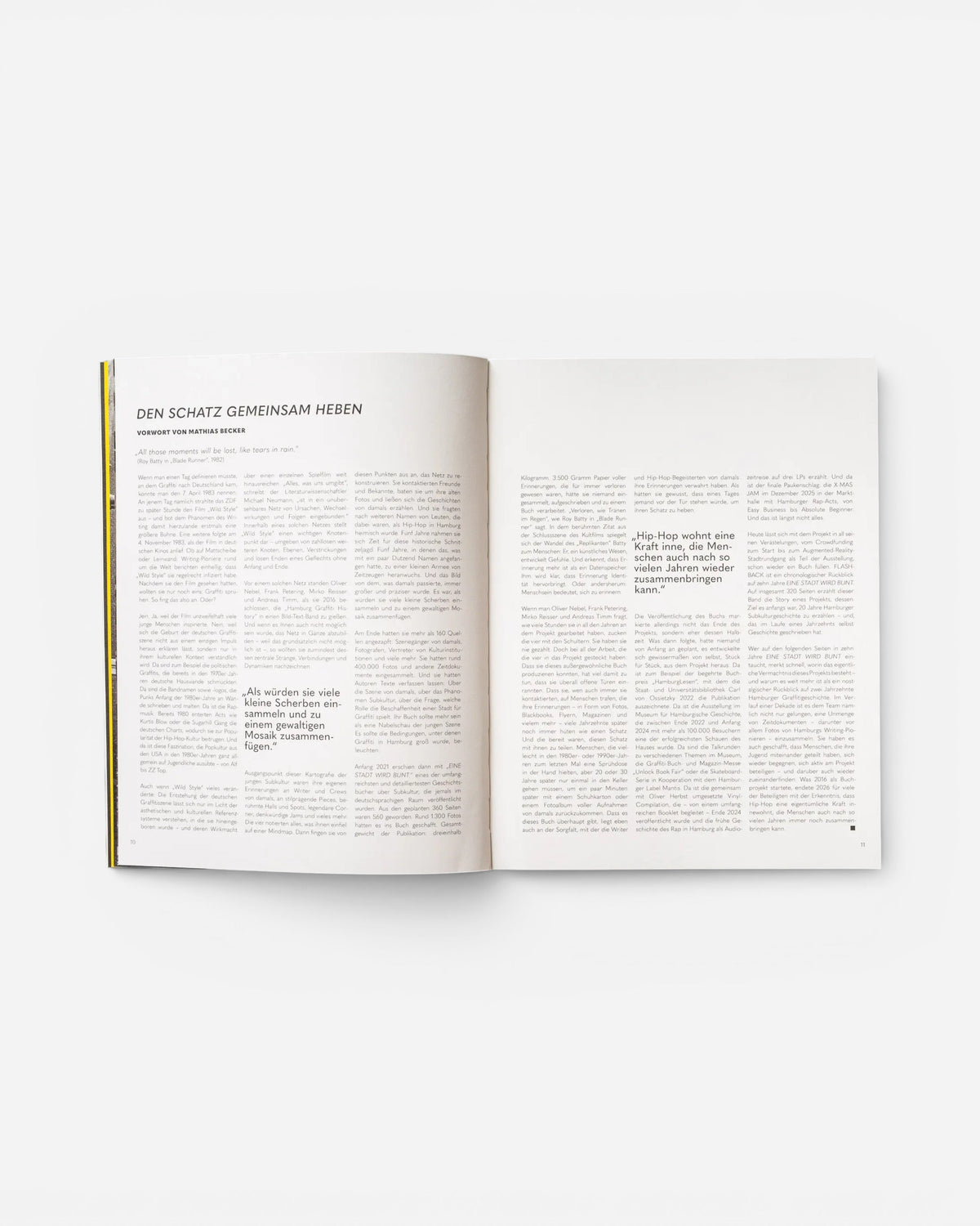 Open pages of the Astrofat EINE STADT WIRD BUNT. – FLASHBACK book featuring German text and editorial layout.