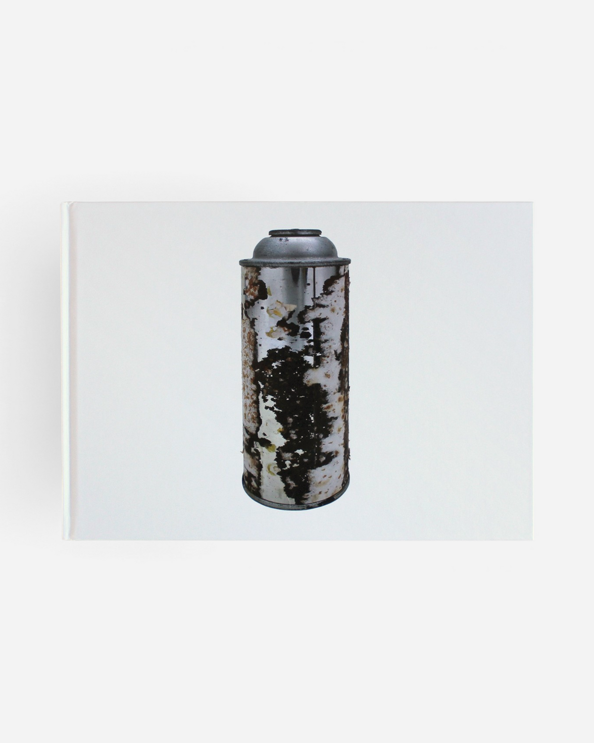 Astrofat Kept Paper Labels limited edition art book featuring a weathered, rusted spray paint can on the cover.