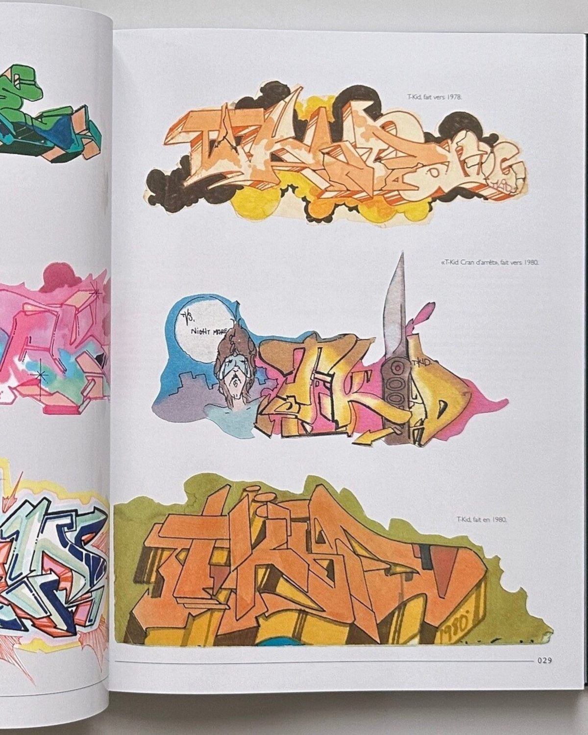Astrofat book featuring graffiti art by T-Kid 170, with colorful bubble letters and spray paint cans.